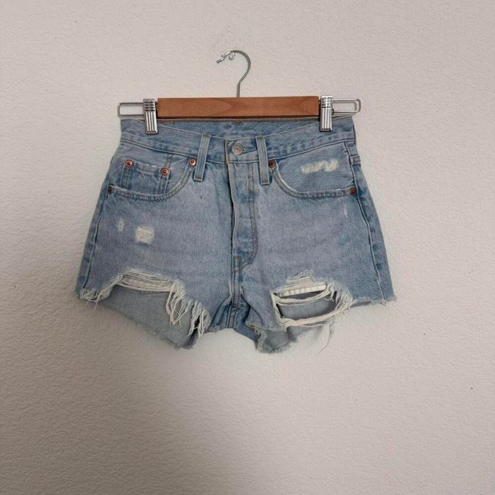 levi’s 501 light‑wash distressed cutoff shorts — size W24
